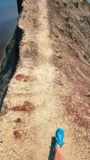 miagreenwald - Walking on cape in the sea