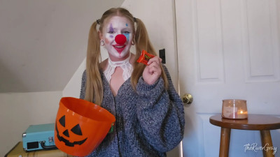 River Gray - Cute Clown In A Cozy Sweater Eating Candy