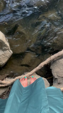 KinkyCanner - My bare feet by the river at sunset in my bridesmaid dress