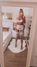 Tonnia - Lingerie, stockings and stilettos tease