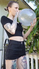 MonstrousMiss - Goth babe blows balloon no pop
