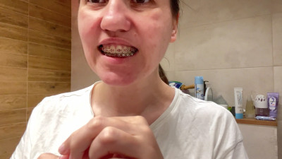 Nicole_Ray - Flossing your teeth with braces